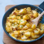 Cheesy Potato Egg Scramble