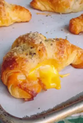 Bacon Egg & Cheese Garlic Parm Croissants