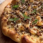 Fungi Truffle Pizza with Garlic Confit & Walnuts